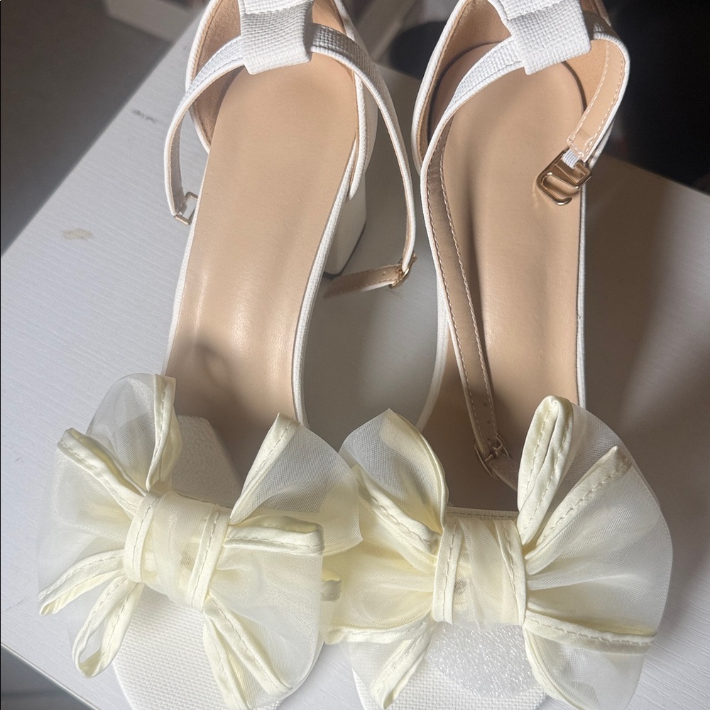 Elegant White and Cream Bow Sandals